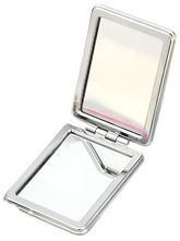 Brighten up your beauty routine with the 'Life is Better with Friends' Kawaii Falling Glitter Travel Mirror! This charming travel mirror features an adorable bear and fox in a whimsical cloud and hills scene, with a touch of falling glitter to add a magical sparkle. Compact and practical, it's perfect for on-the-go touch-ups and adding a bit of kawaii charm to your daily routine.